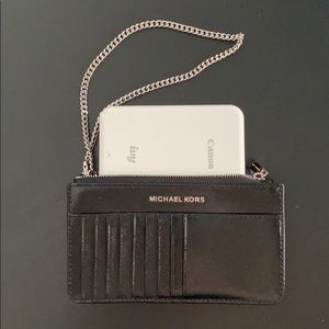 Micheal Kors blk leather wristlet w/cards inserts